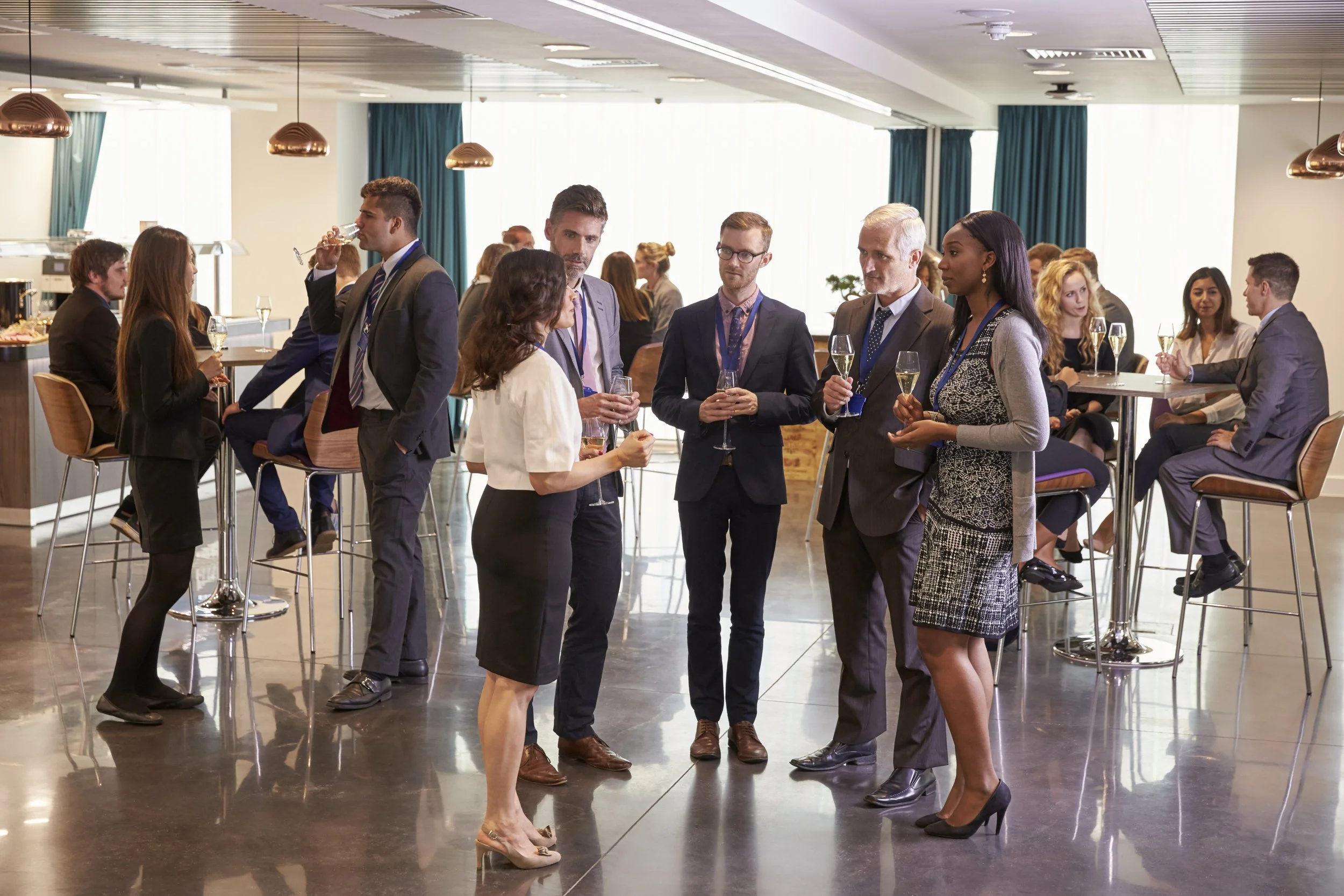 Delegates networking at a conference